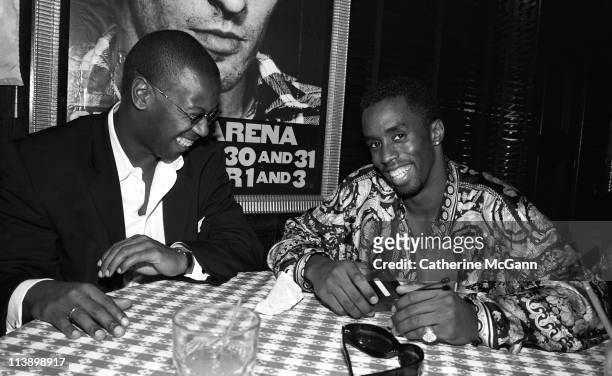 Andre Harrell and Sean 'Diddy' Combs pose for a photo at a party after Lifebeat's Urban Aid benefit concert at Madison Square Garden on October 5,...