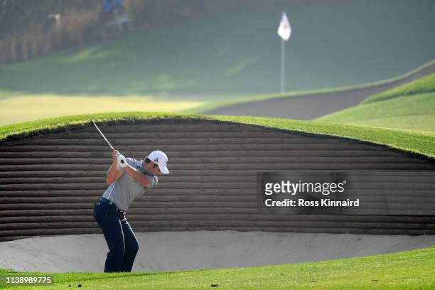 Adrian Otaegui of Spain plays his second shot out of the bunker on the 11th hole during round two of the Hero Indian Open at the DLF Golf & Country...