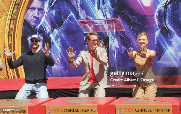 Chris Evans, Robert Downey Jr. And Scarlett Johansson attend Marvel Studios' "Avengers: Endgame" Cast Place Their Hand Prints In Cement At TCL...