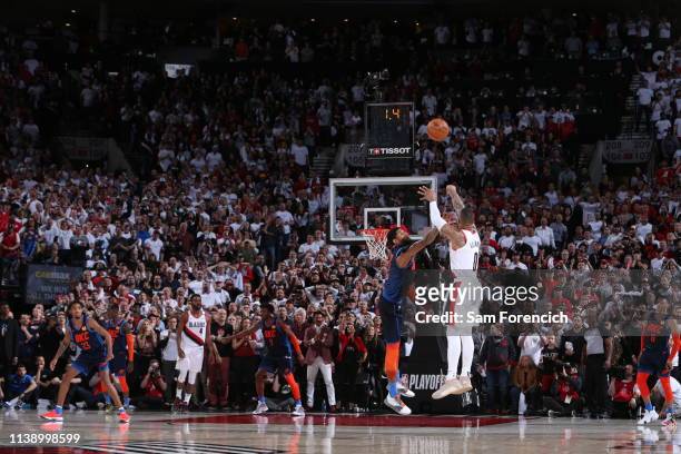 Damian Lillard of the Portland Trail Blazers shoots the three-point shot to win the game against the Oklahoma City Thunder during Game Five of Round...