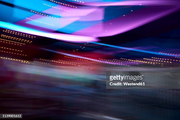 colorful lights in movement, long exposure - moving lights stock pictures, royalty-free photos & images