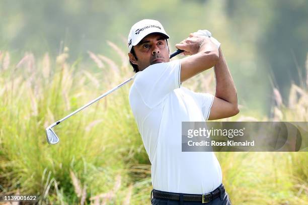 Jyoti Randhawa of India tees off the 17th during round two of the Hero Indian Open at the DLF Golf & Country Club on March 29, 2019 in New Delhi,...