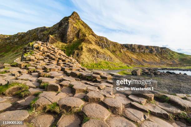 uk, northern ireland, giant's causeway - giant's causeway stock pictures, royalty-free photos & images