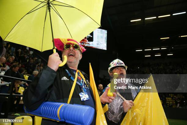 Watford fans impersonate Sir Elton John during the Premier League match between Watford FC and Southampton FC at Vicarage Road on April 23, 2019 in...