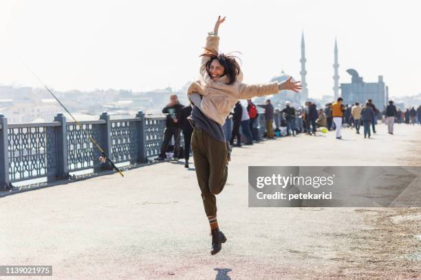 leaping for joy - west asia stock pictures, royalty-free photos & images