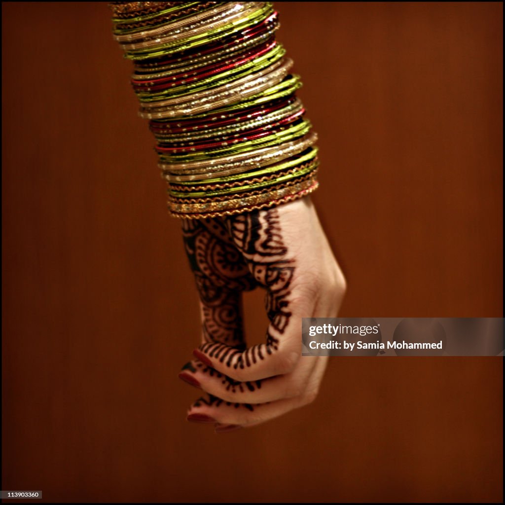 Henna Painted Hand with Bangles