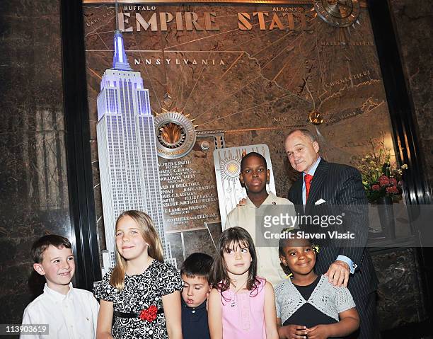 New York City Police Commissioner Raymond Kelly and children of honored NYPD officers attend the lighting ceremony at the Empire State Building on...