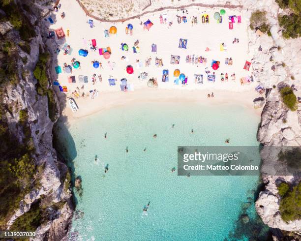 aerial of cala macarelleta beach, menorca - beach sunbathing spain 個照片及圖片檔