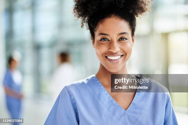 being in this profession gives me great purpose - nurse smiling stock pictures, royalty-free photos & images