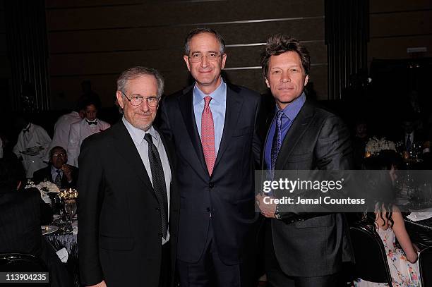 Shoah Foundation Institute Founder Steven Spielberg, Ambassador for Humanity Honoree Brian L. Roberts and Jon Bon Jovi attend the Ambassadors for...