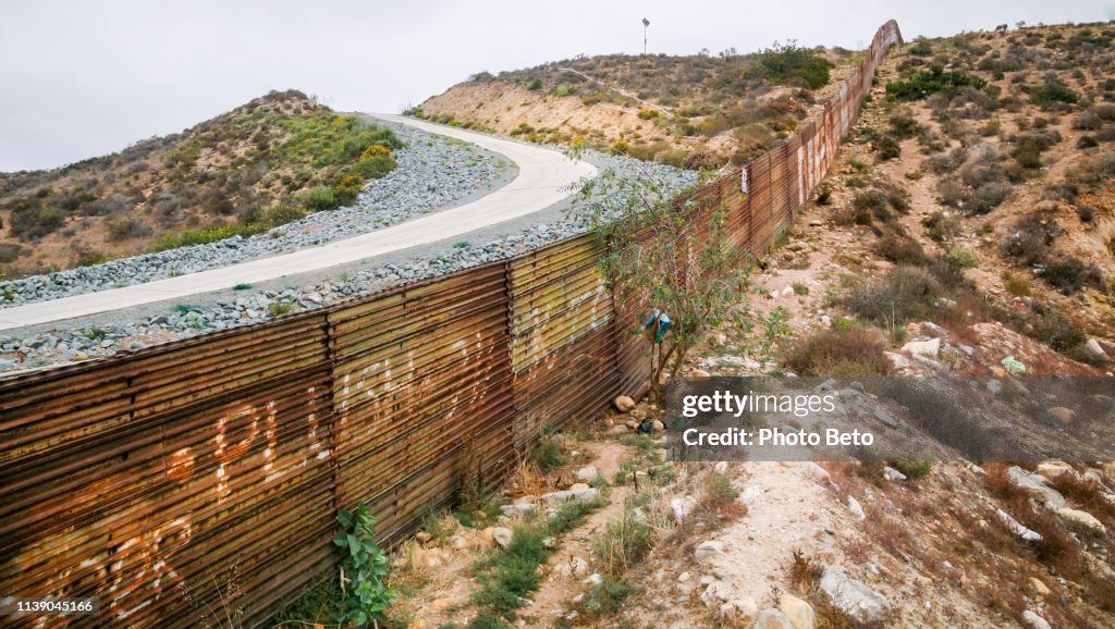 The degraded iron wall along the US-Mexico border in Tijuana Beach in Baja California northern Mexico