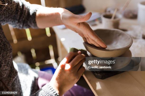 potter at work - moulding a shape stock pictures, royalty-free photos & images