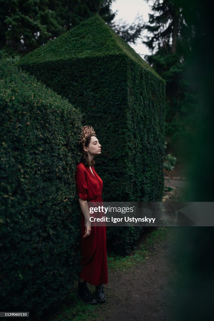 Young woman walking in public park