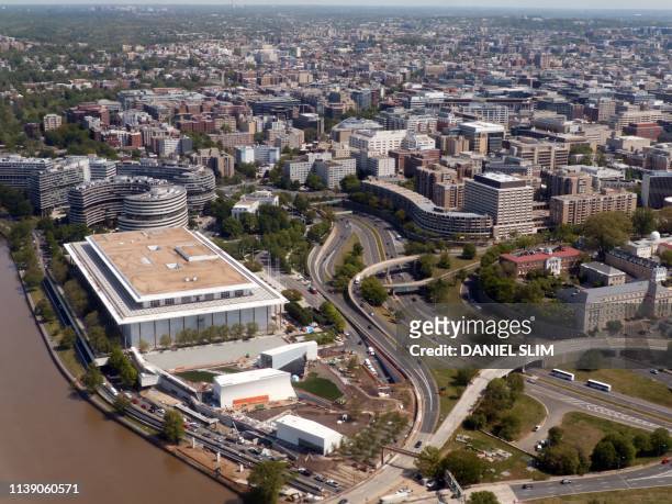 An aerial view of the John F. Kennedy Center for the Performing Arts and the Watergate Complex in Washington, DC, on April 23, 2019.