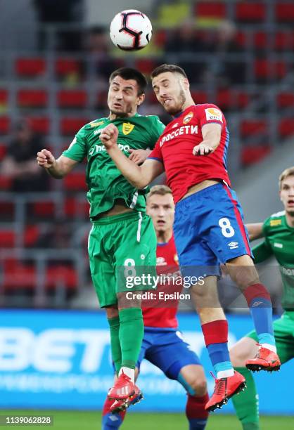 Nikola Vlasic of PFC CSKA Moscow and Shakhban Gaydarov of FC Anji Makhachkala vie for the ball during the Russian Football League match between PFC...