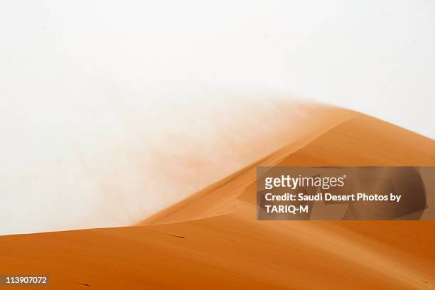 blowing sand - saudi arabia desert stock pictures, royalty-free photos & images