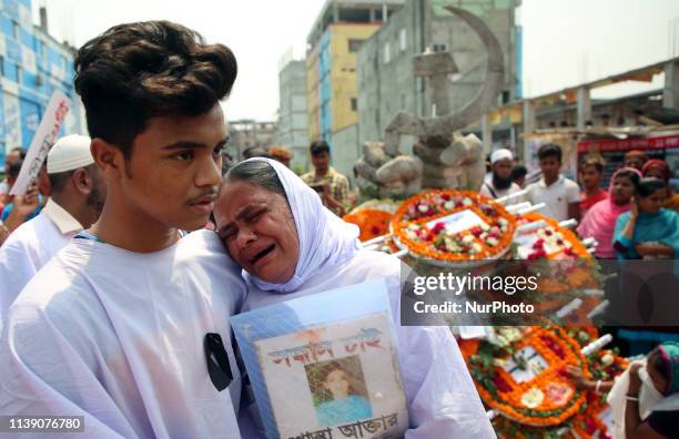 Bangladeshi activists and relatives of victims of the Rana Plaza building collapse take part in a protest to mark the sixth anniversary of the...