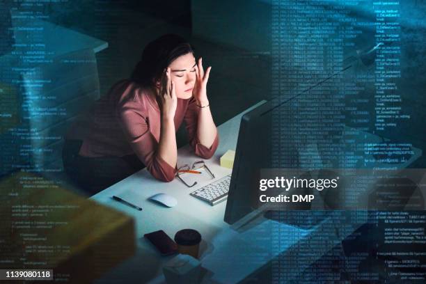 debugging during the dark hours - frustrated stock pictures, royalty-free photos & images