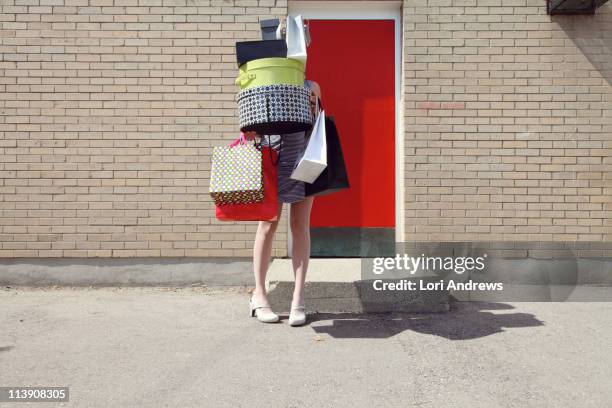 woman with shopping bags and boxes - carrying bildbanksfoton och bilder