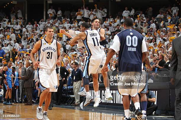 Greivis Vasquez and Mike Conley of the Memphis Grizzlies celebrate after Vasquez hit the game-tying three-point shot, sending the game into a second...