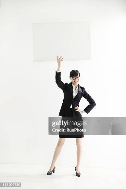 young business woman with a panel - holding prop stock pictures, royalty-free photos & images