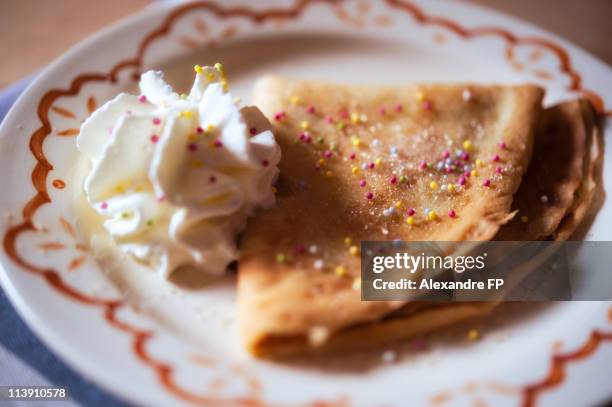 folded french pancakes with sprinkles - whipped cream stock pictures, royalty-free photos & images