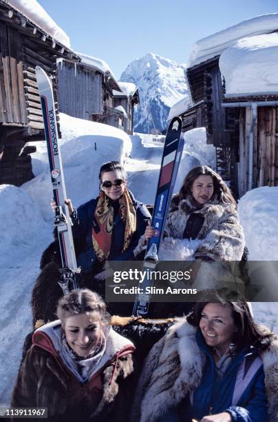 Skiers in a horsedrawn gondola in Klosters, Switzerland, March 1981.