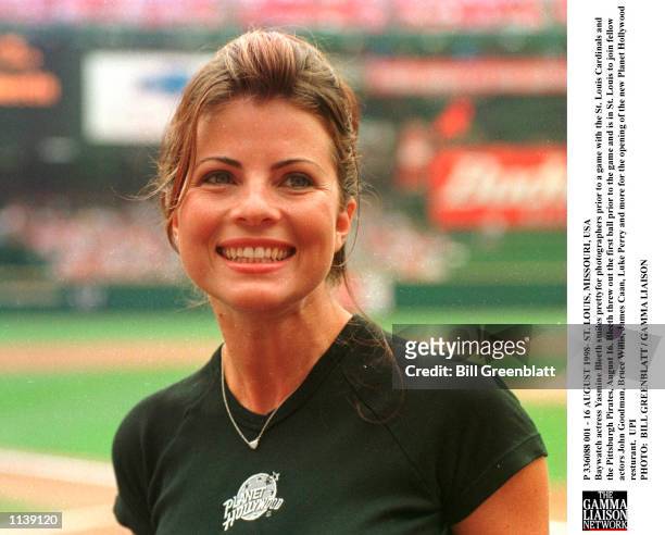 Baywatch actress Yasmine Bleeth smiles pretty for photographers prior to a game with the St. Louis Cardinals and the Pittsburgh Pirates, August 16....
