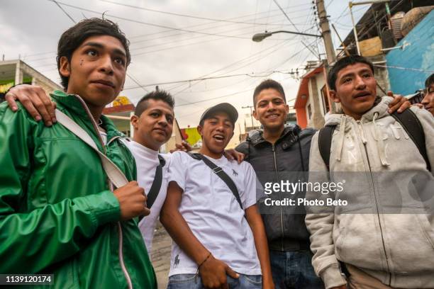 a gang in the streets of the alvaro obregon district in western mexico city - mexico slums stock pictures, royalty-free photos & images