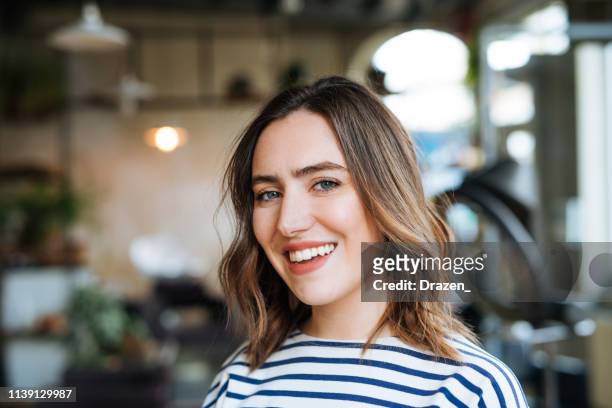 portrait of beautiful caucasian millennial woman with blue eyes - two toned hair stock pictures, royalty-free photos & images