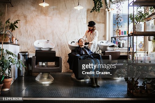 Hair Washing And Rinsing In Fancy Hair Salon High-Res Stock Photo - Getty  Images
