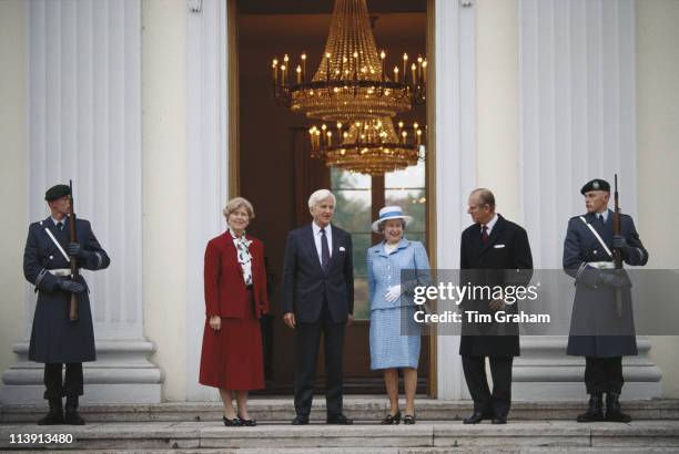Marianne von Weizsacker and her husband, President of the Federal Republic of Germany, Richard von Weizsacker, say farewell to Queen Elizabeth II and...