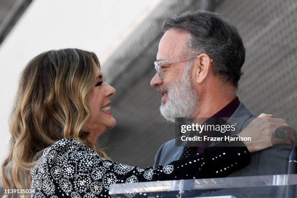 Rita Wilson and Tom Hanks embrace as Wilson is honored with a star on the Hollywood Walk of Fame on March 29, 2019 in Hollywood, California.