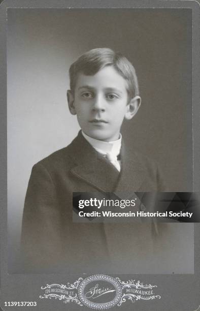 Waist-up studio portrait of Herbert Paul Brumder , the youngest child of George and Henriette Brandhorst Brumder, Milwaukee, Wisconsin, 1893. He is...