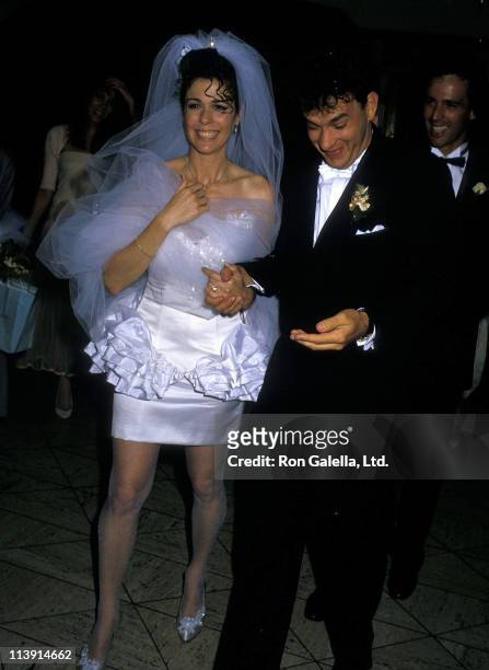 Actress Rita Wilson and actor Tom Hanks attend their wedding reception on April 30, 1988 at Rex's in Los Angeles, California.