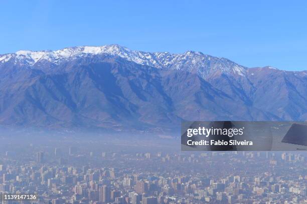 andes and buildings - los andes mountain range in santiago de chile chile stock pictures, royalty-free photos & images