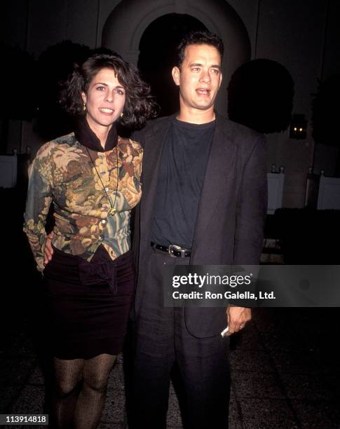 Actress Rita Wilson and actor Tom Hanks on November 28, 1990 dine at L'Orangerie Restaurant in West Hollywood, California.