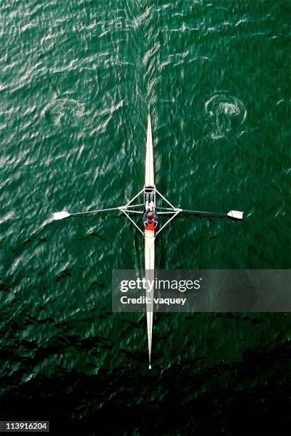 rowing into the dark - single scull stockfoto's en -beelden