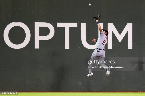 JaCoby Jones of the Detroit Tigers makes a catch on the warning track in the sixth inning of a game against the Boston Red Sox at Fenway Park on...