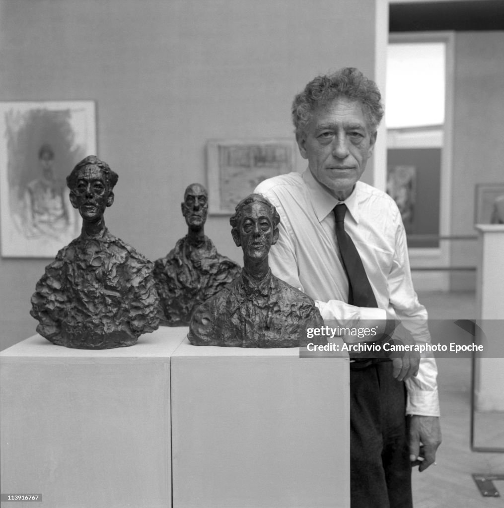 With His Sculptures