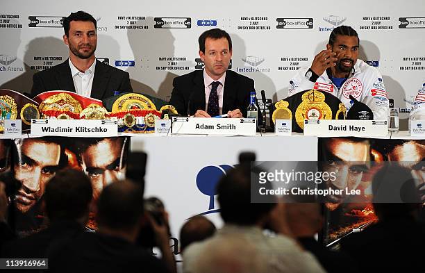 David Haye talks to the press as Wladimir Klitschko listens during the David Haye v Wladimir Klitschko Press Conference at the Park Plaza Hotel on...