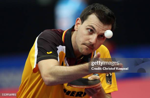 Timo Boll of Germany serves during the first round Men's Single match against Kenji Matsudaira of Japan during the World Table Tennis Championships...