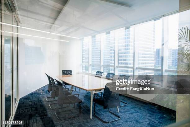 interior shot of modern designed boardroom in office building - boardmember stock pictures, royalty-free photos & images