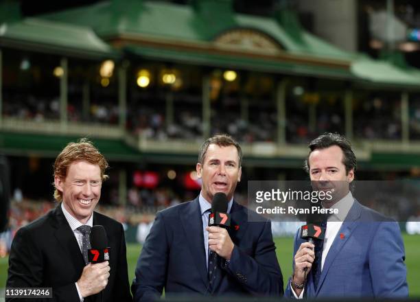 Cameron Ling, Wayne Carey and Hamish McLachlan commentate during the round two AFL match between the Sydney Swans and the Adelaide Crows at Sydney...