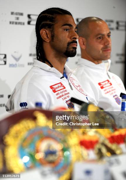 David Haye talks to the press with his manager and trainer Adam Booth during the David Haye v Wladimir Klitschko Press Conference at the Park Plaza...