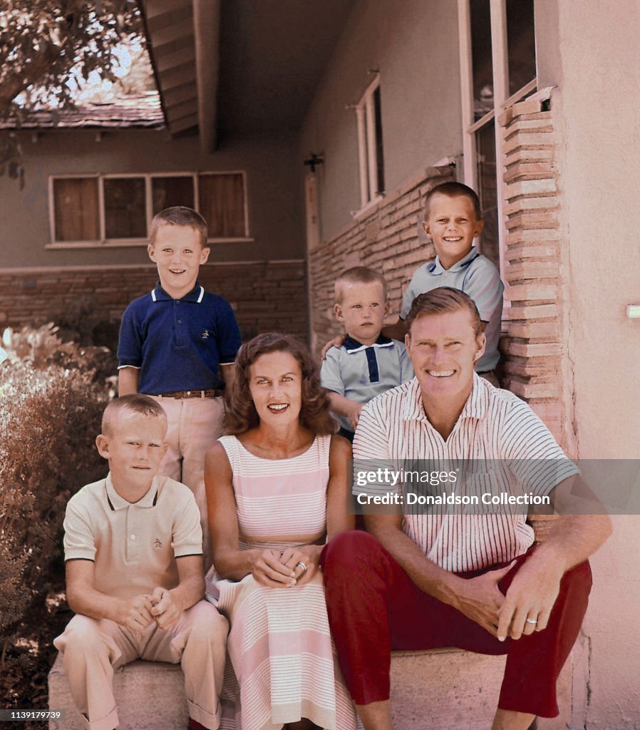 Actor Chuck Connors at home with his wife Elizabeth Jane Riddell