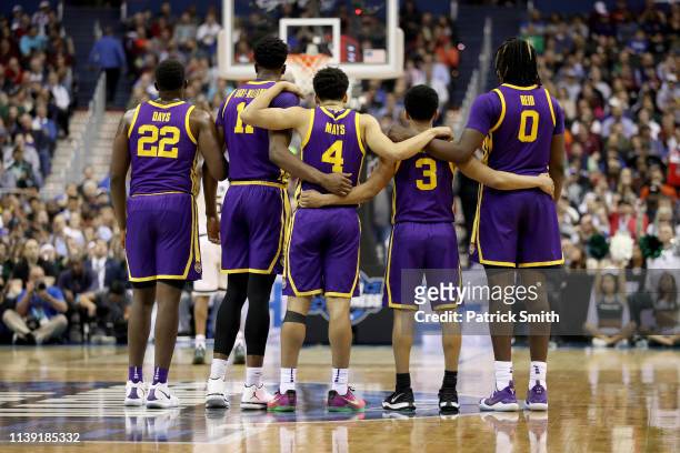 Darius Days, Kavell Bigby-Williams, Skylar Mays, Tremont Waters and Naz Reid of the LSU Tigers huddle together against the Michigan State Spartans...