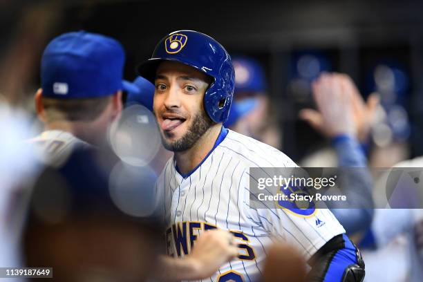 Ryan Braun of the Milwaukee Brewers celebrates with teammates following a three-run home run during the third inning of a game against the St. Louis...