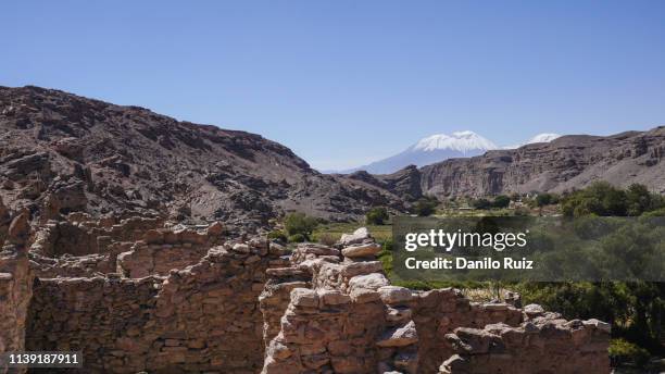 ruins of an ancient village through the valleys of peru in south america - ica cave stock pictures, royalty-free photos & images