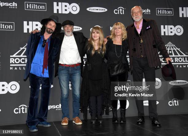 Mike Campbell, John McVie, inductee Stevie Nicks, Christine McVie and Mick Fleetwood of Fleetwood Mac pose in the press room during attends the 2019...